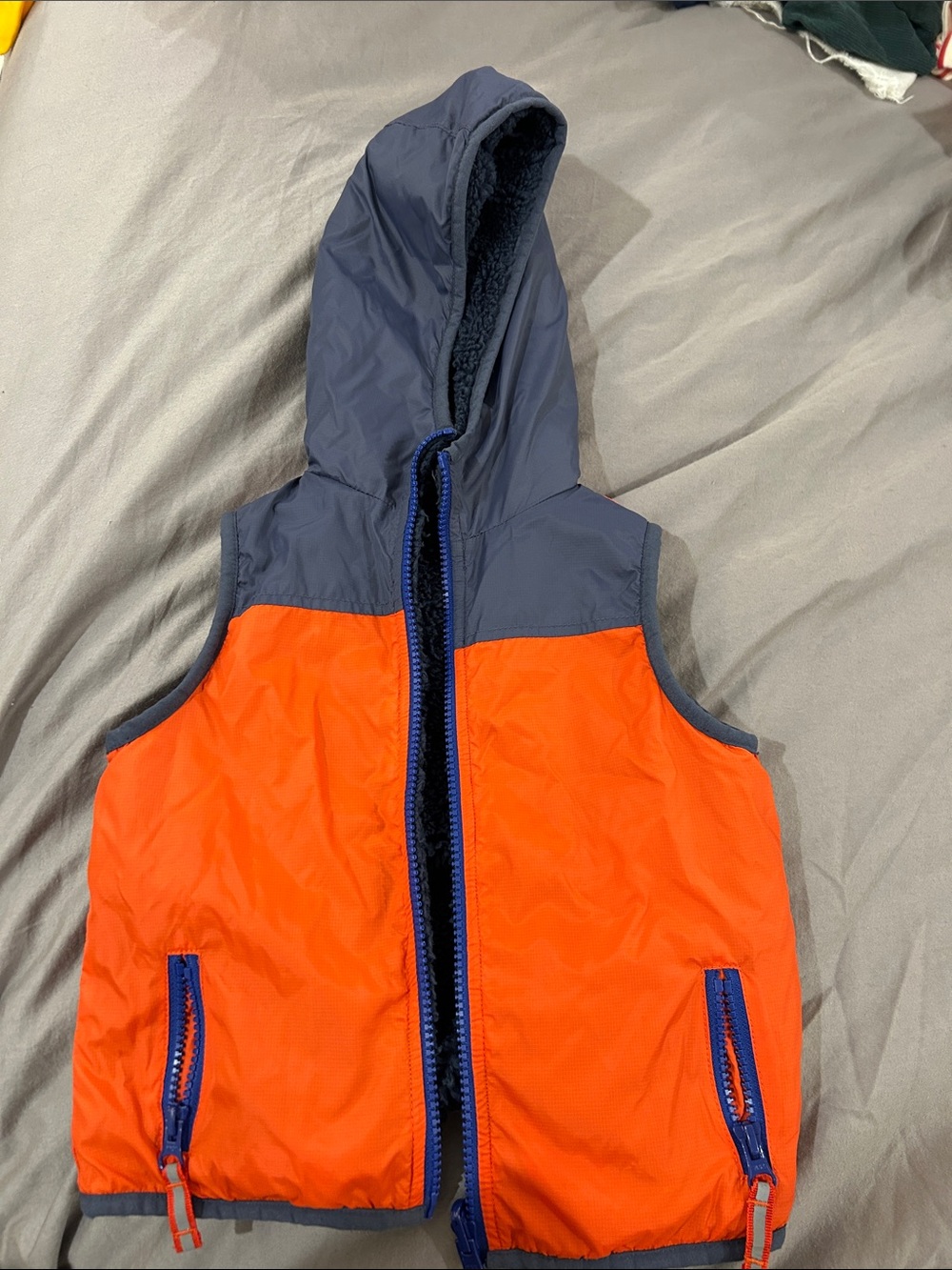 Mini Boden kids reversible Hooded Puffer Vest in Red and Navy